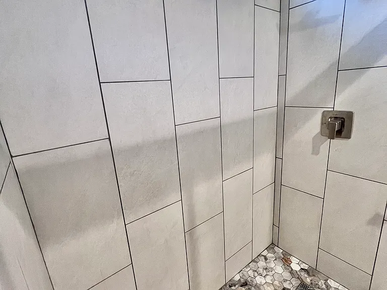 New tiled walk-in shower July 2026