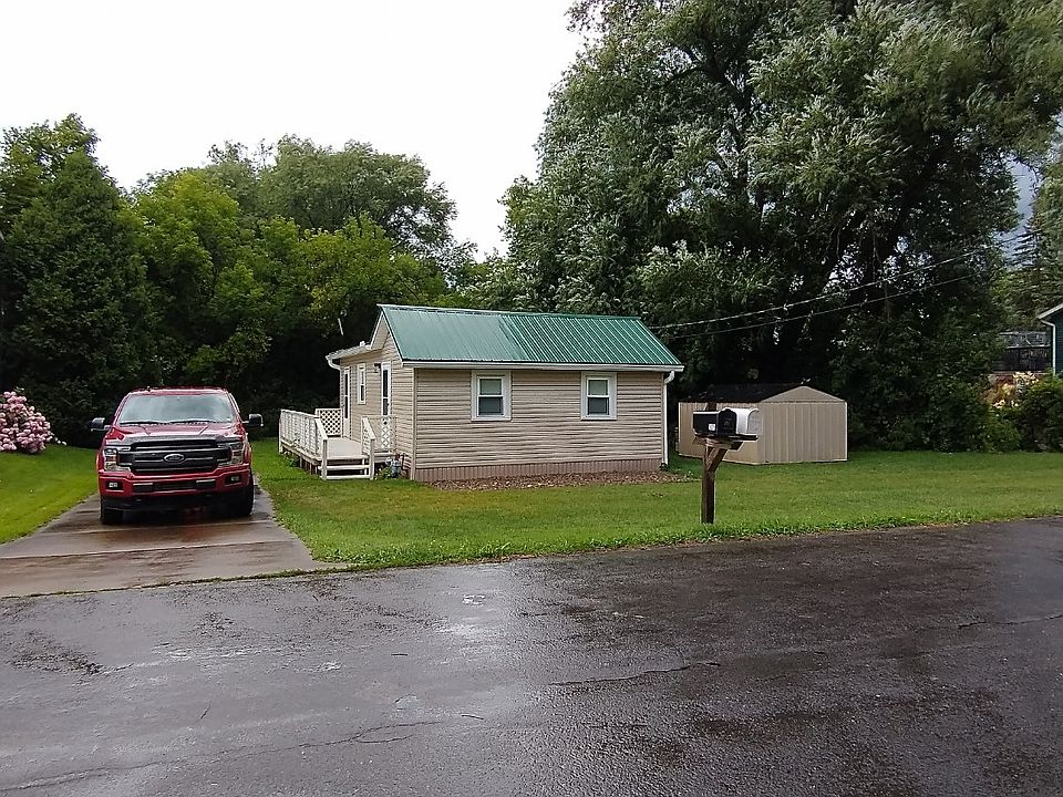 View from the road, driveway can fit two cars
