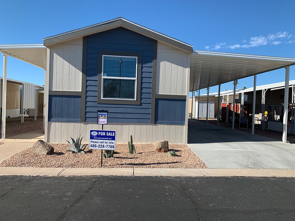 EXTERIOR W/ TWO AWNINGS