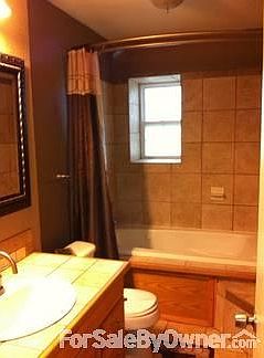 Guest Bathroom
						:
						Tile shower with Jacuzzi tub