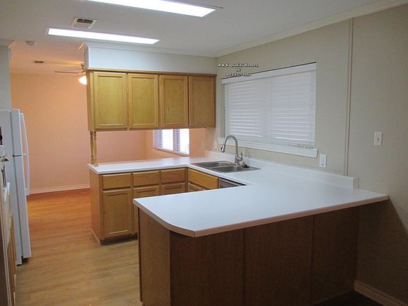 Kitchen area / Please note new frig and range in next photo