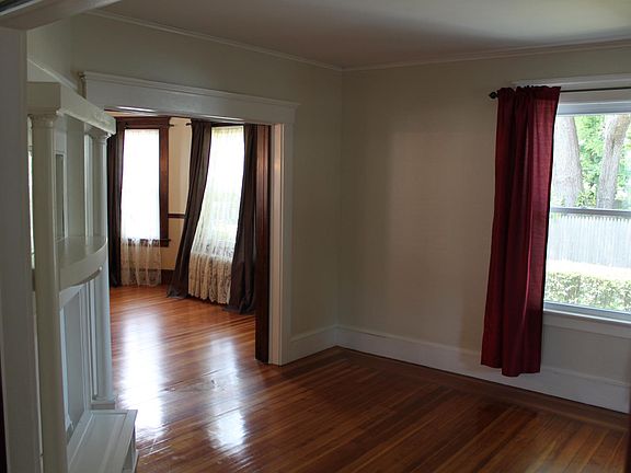 Living room opening to Dining room through pocket doors.