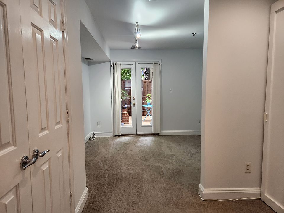 View of bedroom and patio from the living room