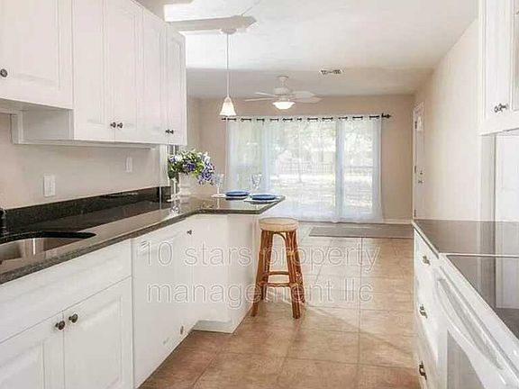 4th image of 5415 70th Way N