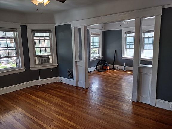 In the living room, looking towards the dining room
