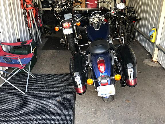 Full size covered garage included for car or toys!