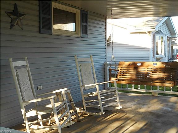 Porch swing to remain with the house.