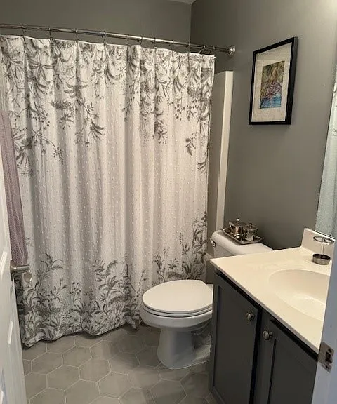 Guest Bathroom upstairs with large linen closet.