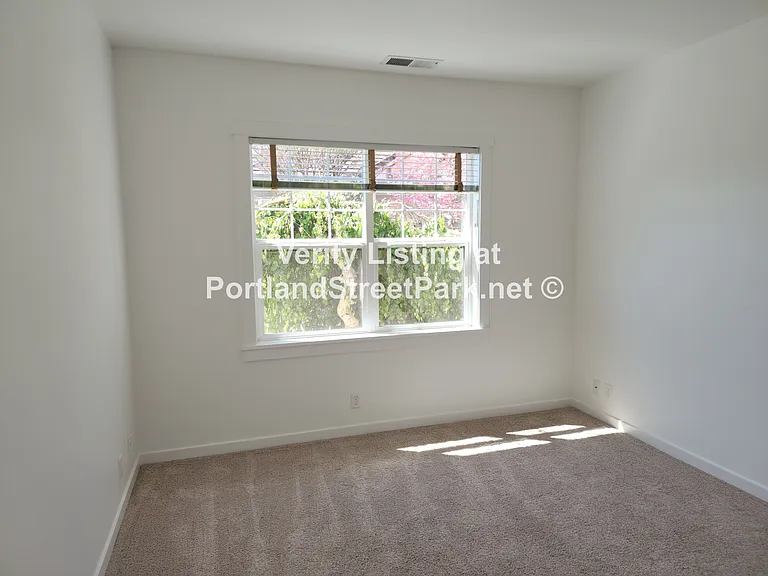 Sunny corner bedroom 1