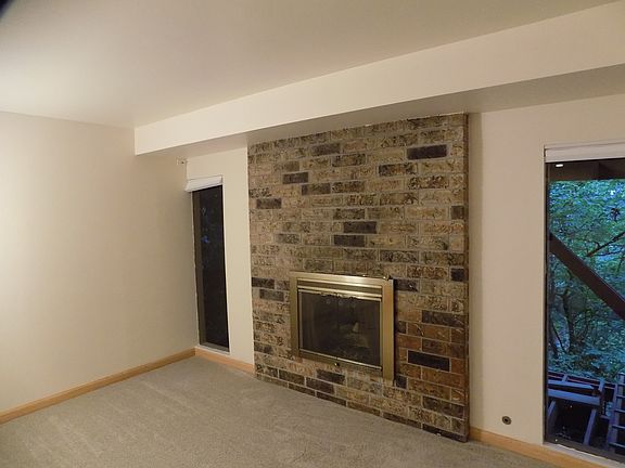 Fireplace in living room. All new floors.