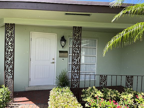 Front Porch. Note: Window replaced with impact Horizontal Window in 2023 (not shown)