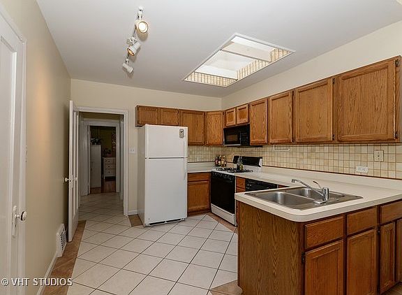 5th image of 5736 W Wilson Ave