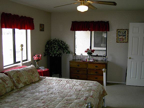 Master Bedroom has Lots of windows to the backyard with lots of natural light!