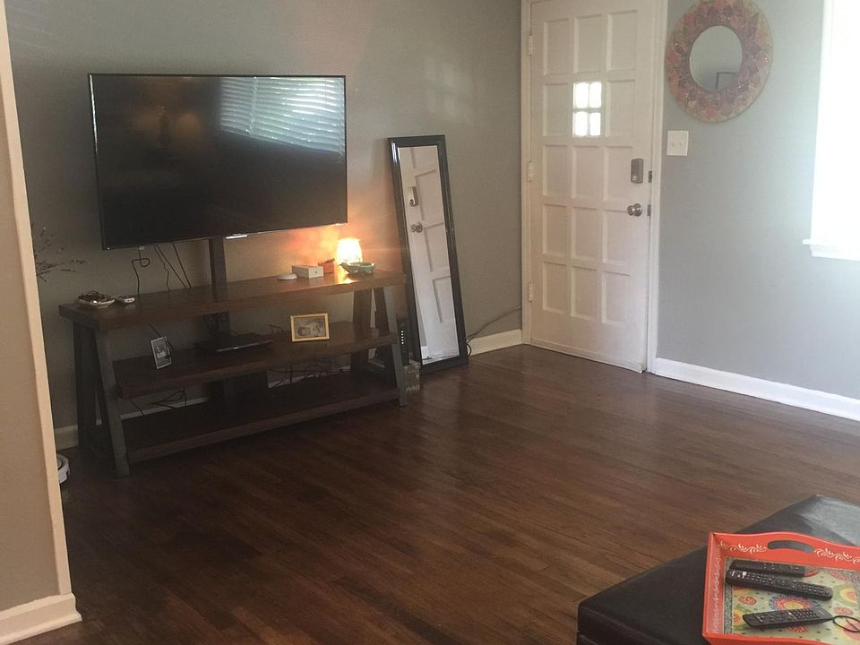 Beautiful Wood Floors and Neutral Gray Paint throughout. Ceiling Fans in all bedrooms. Energy efficient windows.