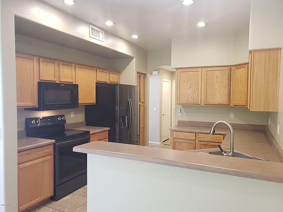5th image of 7214 E Kenwood St