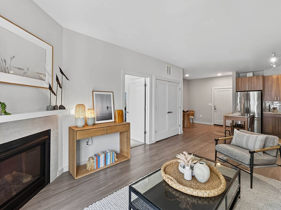 Come home to a living space centered around a cozy fireplace.