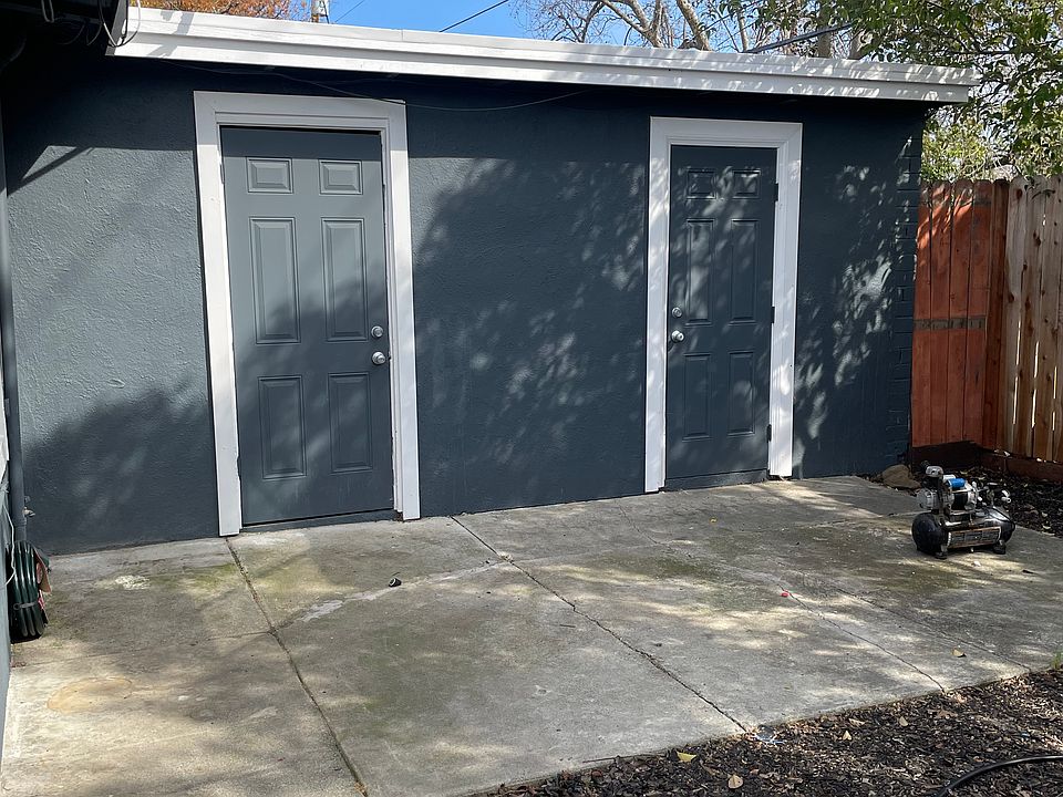 Backyard with 2 storage areas