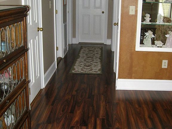 Open Front Hall with Mahogany wood laminate floors
