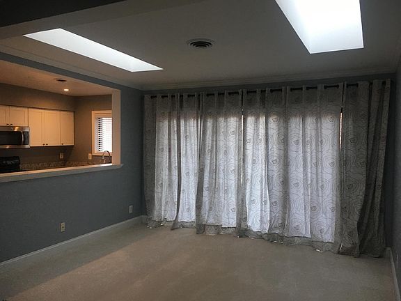 Skylights and pass thru to kitchen