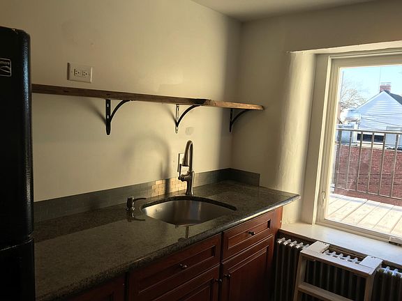 Kitchen sink and fire escape deck area