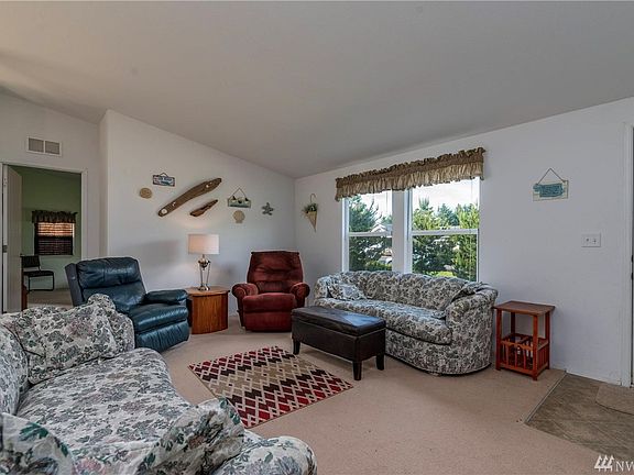 Vaulted ceilings carry through to kitchen. 