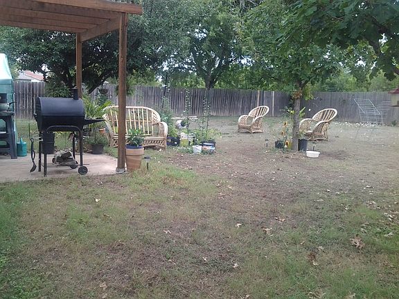 LARGE BACK YARD WITH 5 TREES