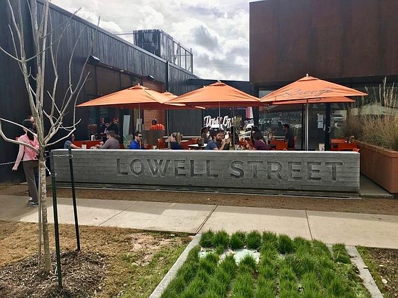 Lowell Street Market lined with cool shops and then chill at a caf.