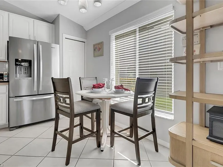7477 Lourdes Ct — Photo 12