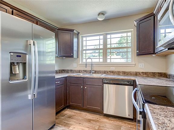 4th image of 7841 Troup Ave