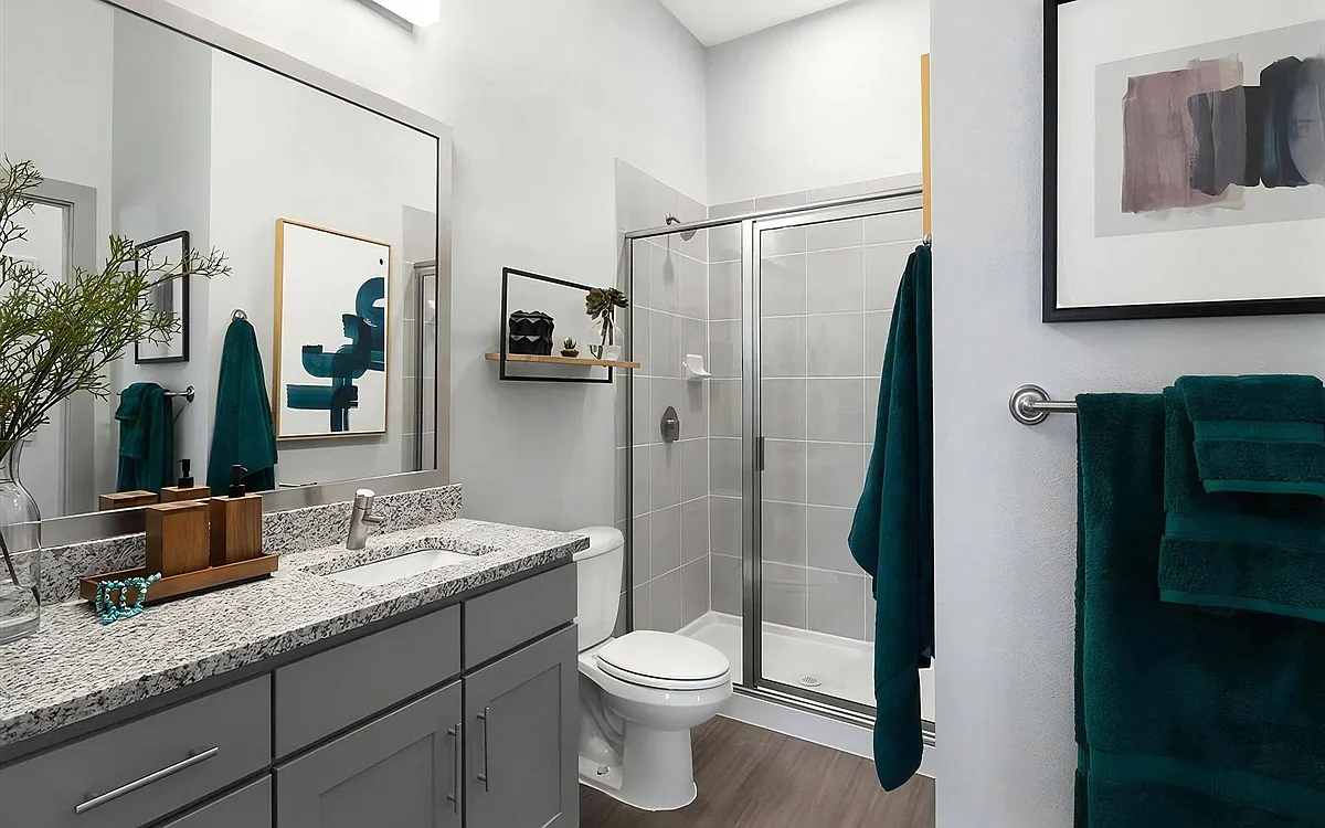Rhythm Bathroom with Large Shower and Quartz Countertop Vanity - Rhythm