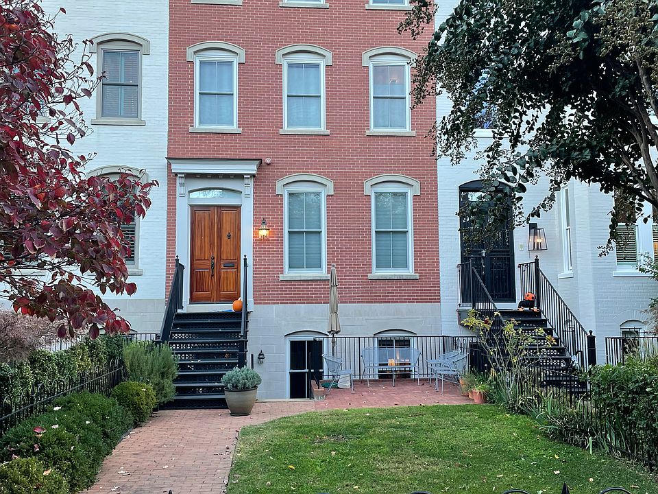 South facing entrance with shared yard and patio.