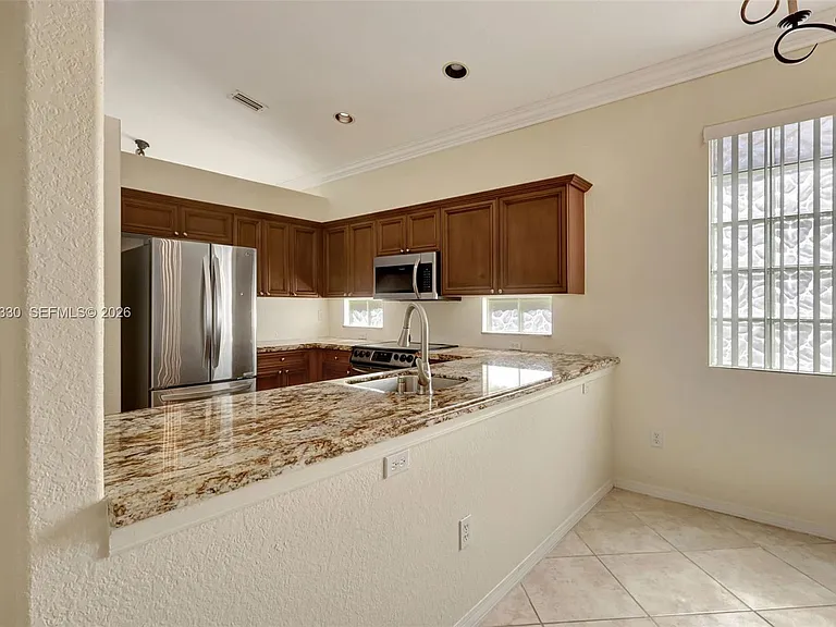 8481 Siciliano St — Photo 10