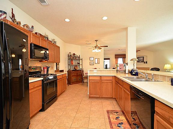 The spacious kitchen is open to all the living areas.