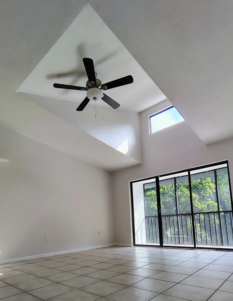Vaulted ceiling over DR and LR w/view of balcony and preserve - 1353 Pine Ridge Cir E #128-E3