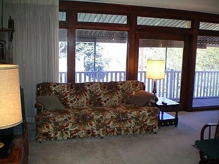 Living room with sliding doors to deck