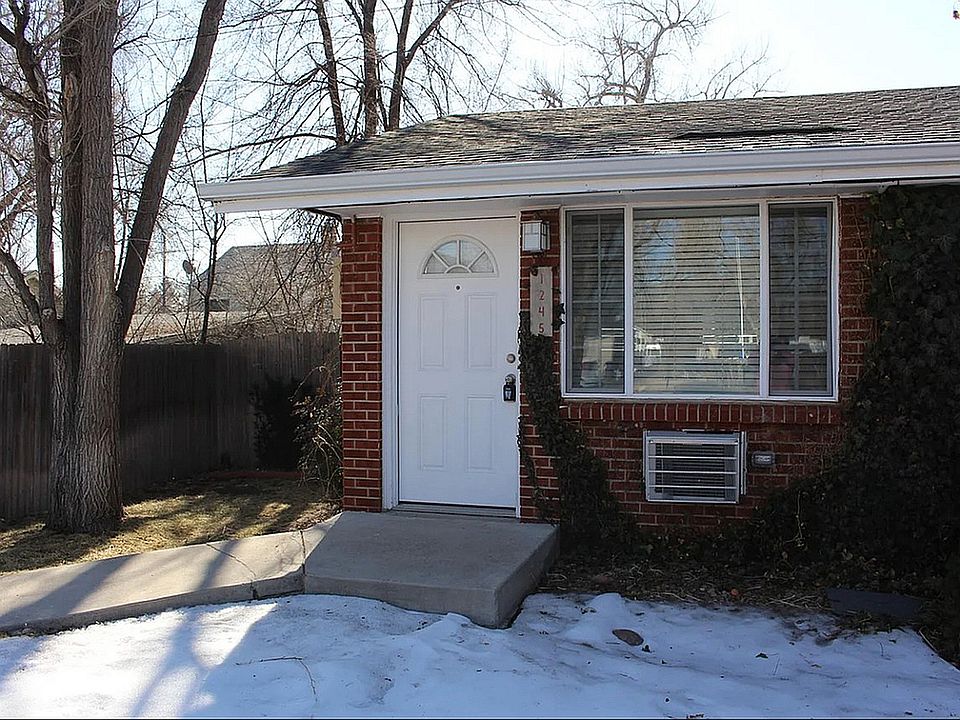 Embrace comfortable living in this charming brick home, perfect for tranquil moments.