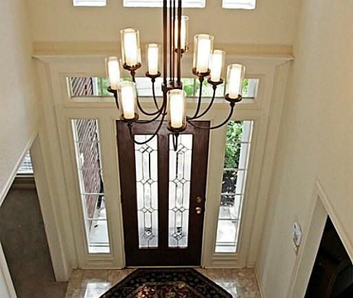 Elegant Foyer With High Ceilings