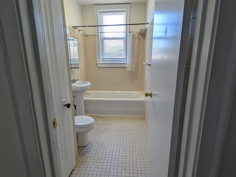 Full Bathroom with a linen closet inside