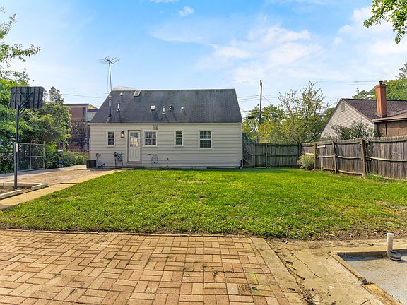 Spacious back yard with a patio