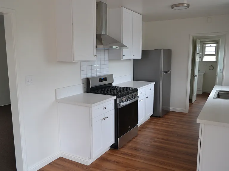 Stove, hood and fridge