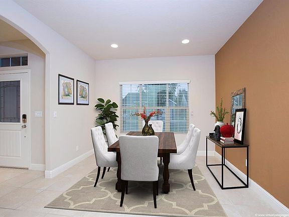 Front formal dining room. Could be office or den.