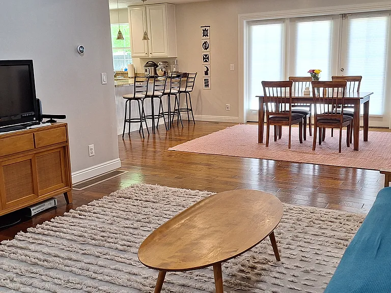 open concept living/dining/kitchen area