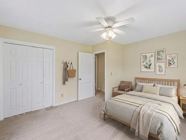 Second bedroom on main floor. (AI staged)
