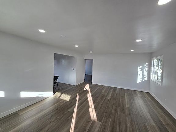 Large Open Living Room connects to large open concept kitchen/dining room
