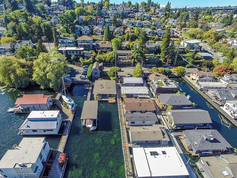Neighborhood ariel view showing famous floating homes across the street. Walking distance to bakery, coffee shops, bar and grills, and fine dinning. Easy bike or bus to Amazon and downtown. Easy access to I5 and 520 for access to east side, Microsoft, and
