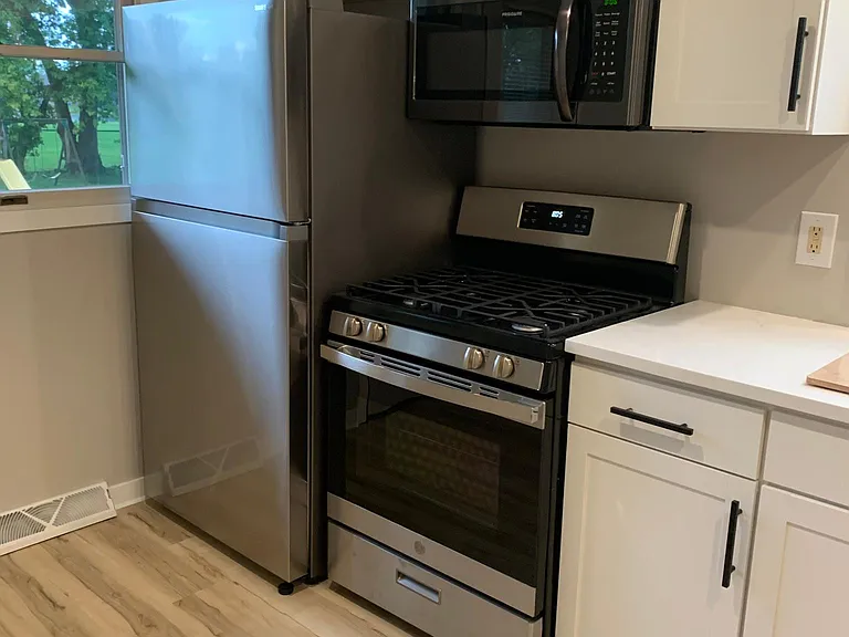 Brand new stainless steel appliances.