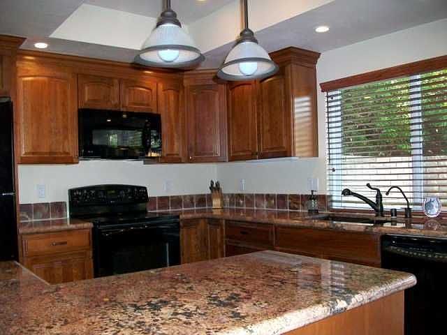 Beautiful kitchen with grantie countertops, and all new appliances