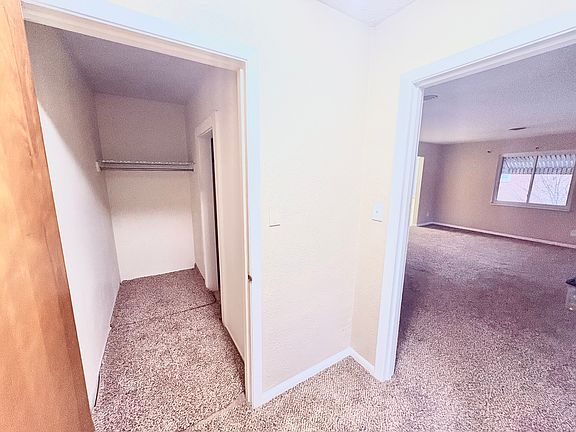 Entryway with large walk-in closet