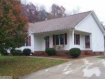 1st image of 202 Woodlea Hollow Ln