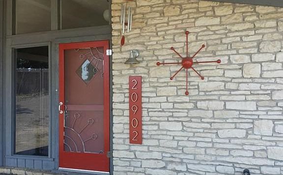 Front entrance showing Mid-Century Modern detailing.